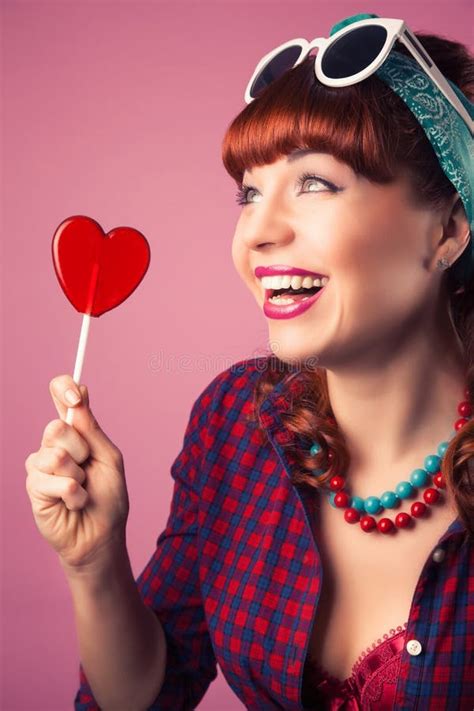 Beautiful Pin Up Girl Posing Red Heart Shaped Lollipop Agai Stock
