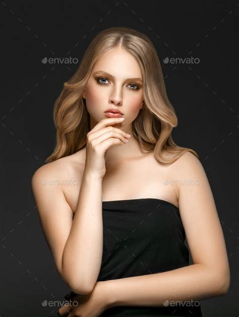 Beautiful Blonde Woman Beauty Model Girl With Perfect Makeup Over Black Background Beautiful
