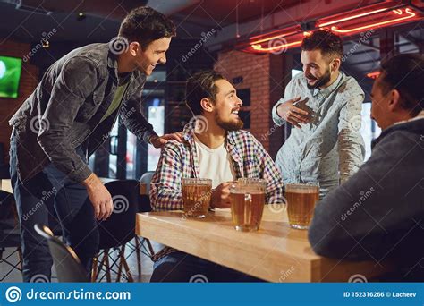 Friends Talk Drink Beer In A Bar Stock Photo Image Of Group Dating