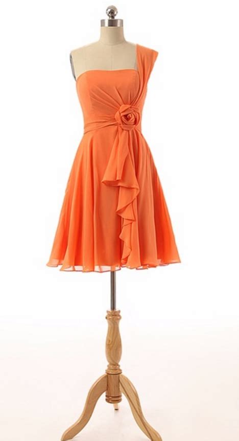 The Actual Sampling Of Silk Opens A Short Cocktail Gown With An Orange