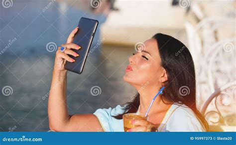 Beautiful Young Woman Takes A Selfie Stock Image Image Of Beauty Frappe 95997373