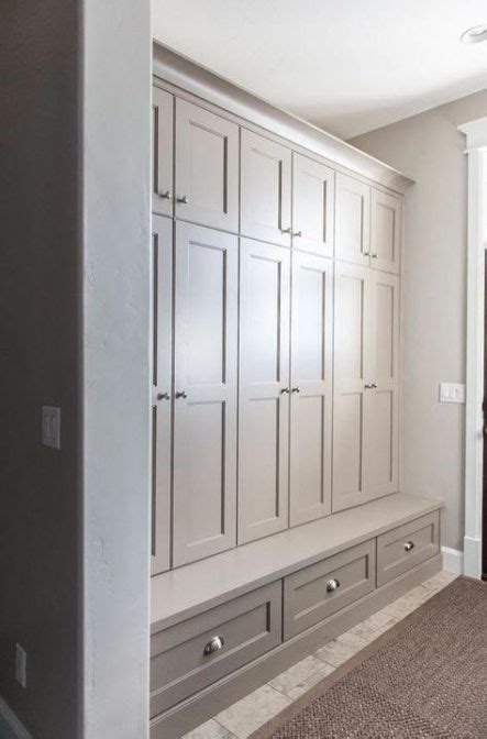 An organized and pleasing garage mudroom. Stairs landing mudroom 24+ Ideas | Mudroom cabinets ...