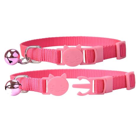 Two Pink Cat Collars With Bells On Each Side