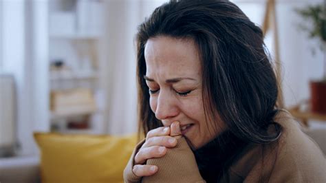 close up of crying sad and depressed woman indoors mental health concept stock video footage