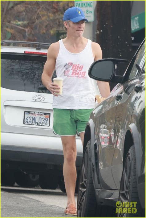 Chris Pine Puts Biceps And Toned Legs On Display In Tank Top And Short