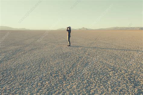 Man Standing In The Desert Nevada Usa Stock Image F0184468