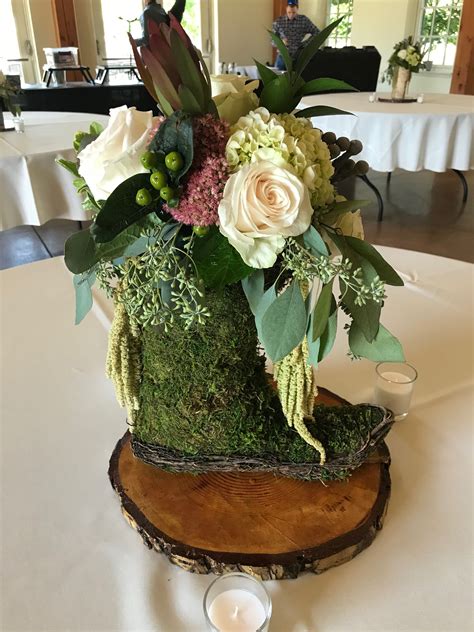 Maybe you would like to learn more about one of these? Cowboy moss boot wedding centerpiece | Wedding ...