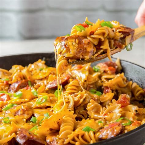 Heat olive oil in a large cooking pot over medium heat. One Pan Cheesy Smoked Sausage Pasta | Karla Rettig | Copy ...