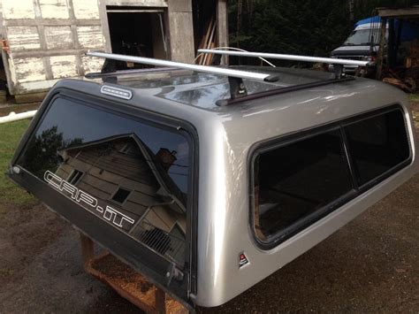 Rack manufactures and sells pickup truck racks, ladder racks, pickup racks, motorcycle racks. Cap-It canopy with Thule roof rack Duncan, Cowichan