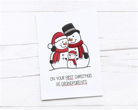 A Christmas Card With Two Snowmen Hugging Each Other
