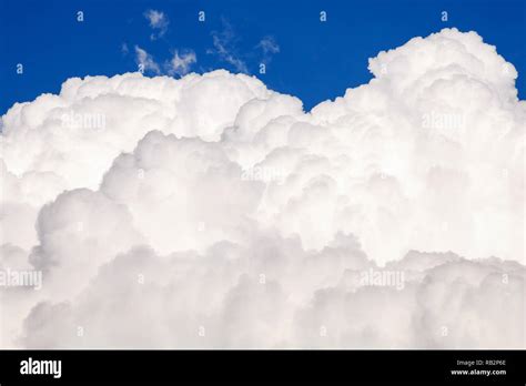 Big White Puffy Cloud On The Blue Sky Stock Photo Alamy