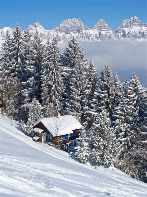 Winter Holiday House In Swiss Alps Stock Photo Colourbox