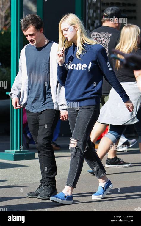 Elle Fanning Spends The Day At Disneyland With A Friend Featuring Elle