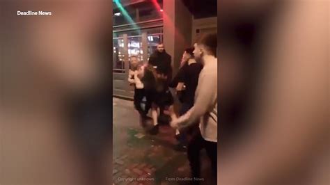 Woman Knocked To Floor After Throwing Punches At Bouncer Outside