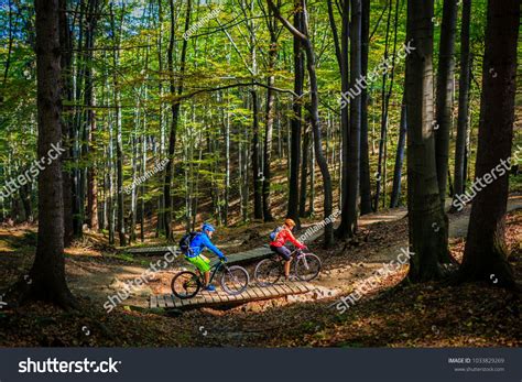 mountain biking women man riding on Royalty Free image photo in 2020 | Mountain biking women 