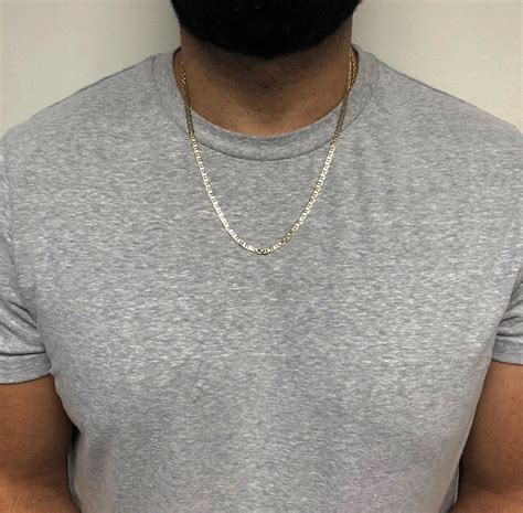 Maybe you would like to learn more about one of these? 10K Yellow Gold Solid Mariner Link Chain 22-24 Inch 4.3mm