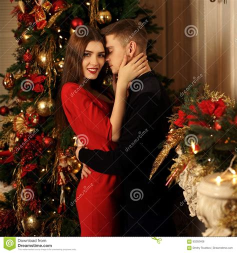 Romantic Couple Hugging In Christmas Interior Stock Photo Image Of