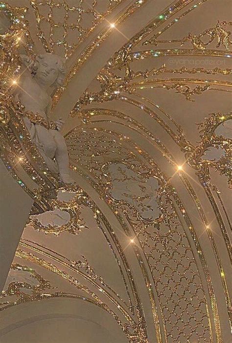The Ceiling Is Decorated With Gold Glitters And Angel Statues On Its Sides