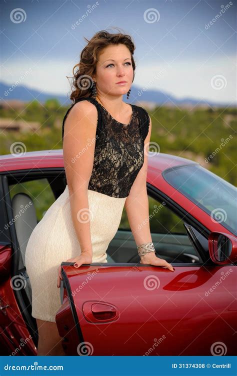 Beautiful Woman Leaning On Car Door Stock Photo Image Of Dress