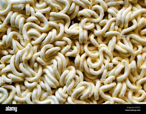 Raw And Dry Instant Ramen Noodles Food Texture Or Background Stock