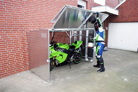 One alternative is to skip the ledger and end board and attach the ramp joists directly to the floor joist with metal hangers. Retractable Motorcycle Shed | Motorbike shed, Motorcycle ...