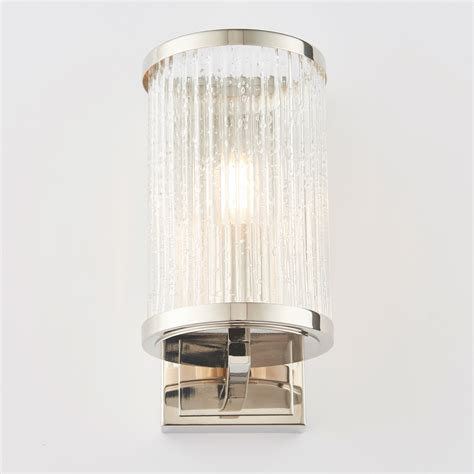 View our large selection of wall lights, from industrial wall lights to contemporary downlights and uplighters suitable for homes and hospitality venues. East - Ribbed Glass Hurricane Lamp Wall Light - Lightbox