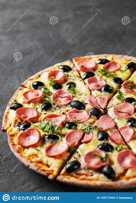 Add in the cheese and mix until cheese is melted and serve. Pizza With Mozzarella Cheese, Olives, Ham, Tomato Sauce ...
