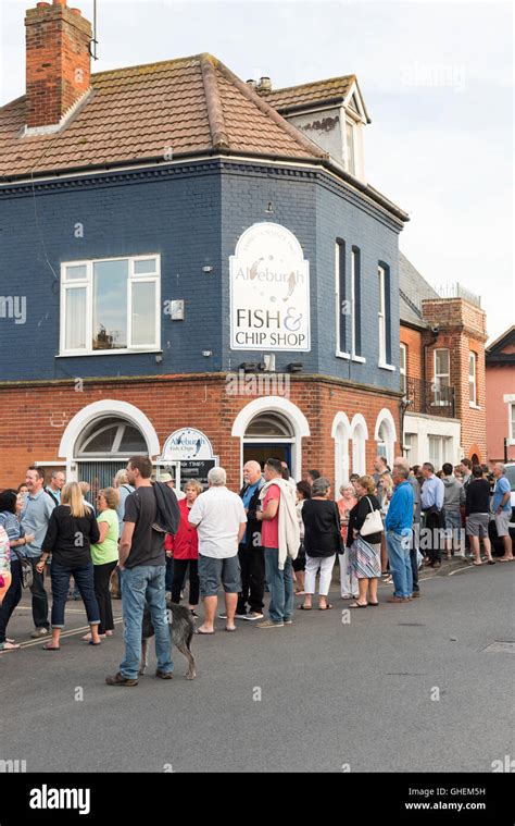 The traditional fish and chip shop in Aldeburgh Suffolk UK with people
