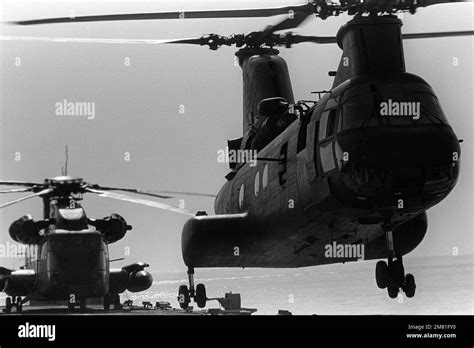 A Ch 46 Sea Knight Helicopter Takes Off From The Flight Deck Of The