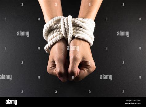White Female Hands In Bondage Tied Up With White Rope Stock Photo Royalty Free Image