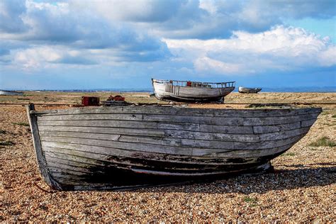 Old Wooden Fishing Boats On A Pebble Beach Photograph By Gill Copeland