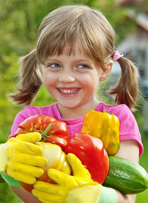 Happy Little Girl Holding Vegetables Stock Image Image Of Cucumber