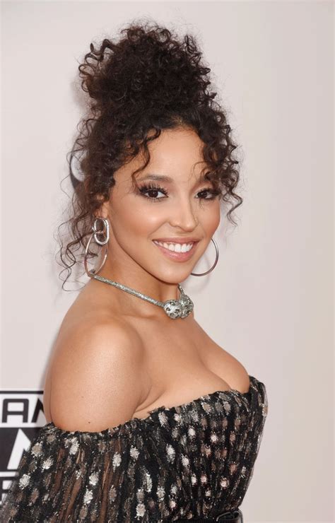 Look sweet by incorporating ribbons into your hairstyle. 21 Curly Hairstyles That Are Seriously Cute for 2017 | Glamour