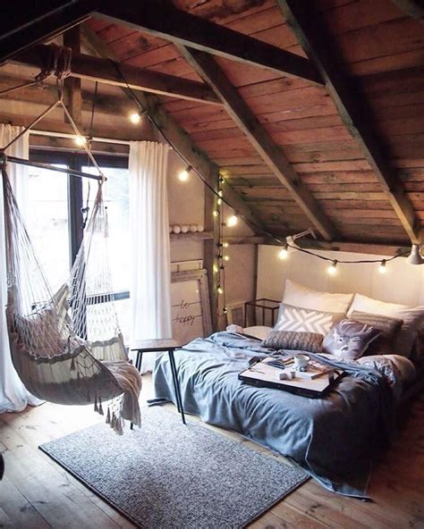 This Swing Chair Attached To A Rafter Creates A Laid Back Atmosphere