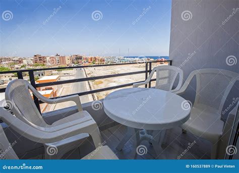 Terrace Balcony With Chairs In Tropical Luxury Apartment Stock Image