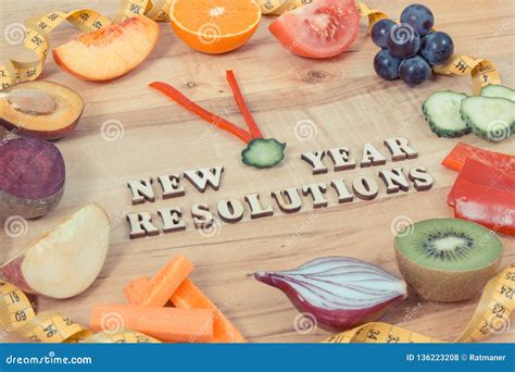 Fruits With Vegetables In Shape Of Clock Time To New Year Resolutions And Healthy Nutrition