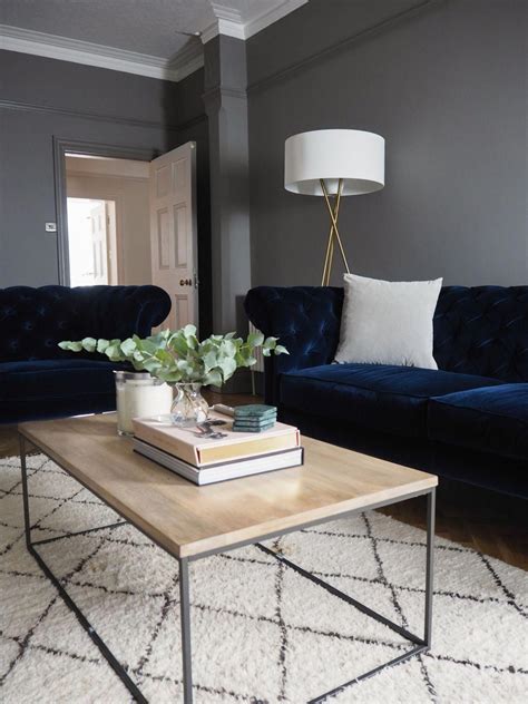 A velvet sofa is the ultimate style statement for your living room. Our living room - adding the final touches with West Elm. Dark grey walls, blue velvet sof ...