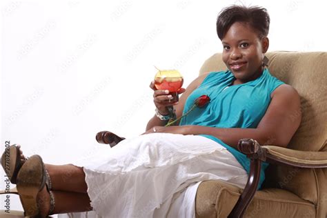 Happy Black Woman Relaxing In Lounge Chair Stock Photo Adobe Stock