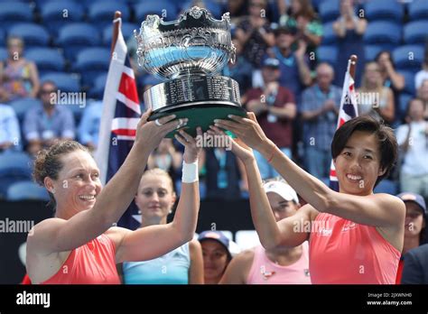 Samantha Stosur Of Australia Left And Shuai Zhang Of China Pose For A