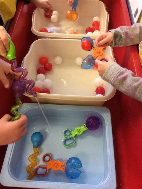 Children Used Eye Droppers To Move Water From One Tub To Another They