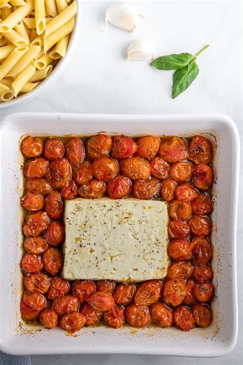 A new trend has recently taken over tiktok, and it's unexpectedly straightforward: Baked Feta and Cherry Tomato Pasta - To Simply Inspire