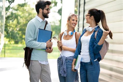 Group Of Happy University Students Studying Together And Having Fun