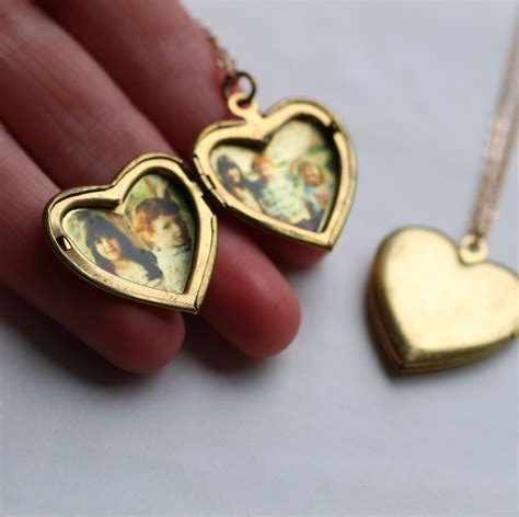 An Beautiful Pair Of Vintage Lockets Both With Space Inside For
