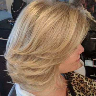 Medium bob with bangs over 50. 80 Best Hairstyles for Women Over 50 to Look Younger in 2019