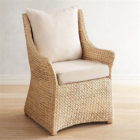 Modern curves redefine classic wishbone seating. Alexa Hand-Woven Dining Chair | Wicker dining chairs ...