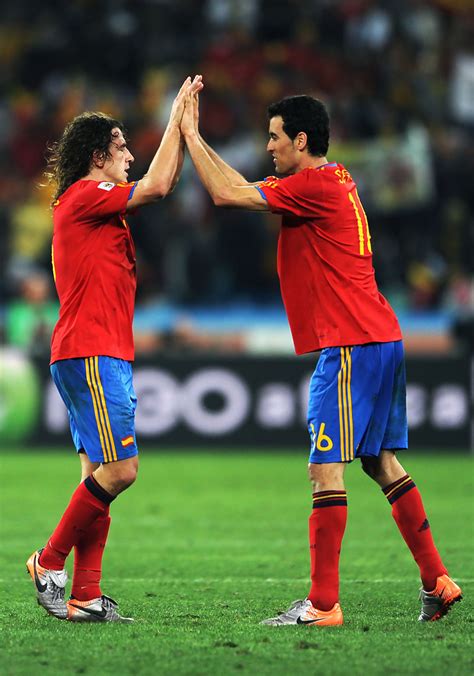 Carles Puyol, Sergio Busquets - Carles Puyol Photos - Germany v Spain: 2010 FIFA World Cup 