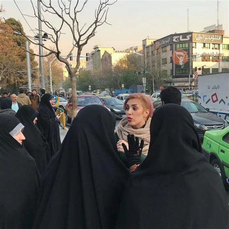 women in iran risking arrest by removing their islamic headscarves have been labeled as drug