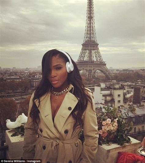 Serena Williams Flashes Cleavage In Front Of Eiffel Tower In A Rain Mac