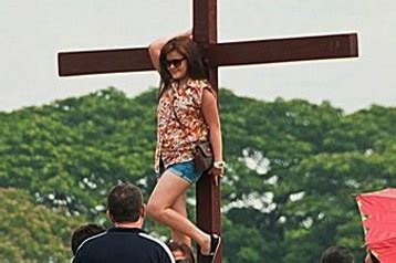 Girl In Skimpy Shorts Poses In Front Of Cross Sparks Outrage Abs Cbn News
