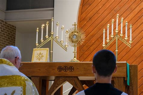 Priest And Altar Boy At Benediction Catholic Stock Photo